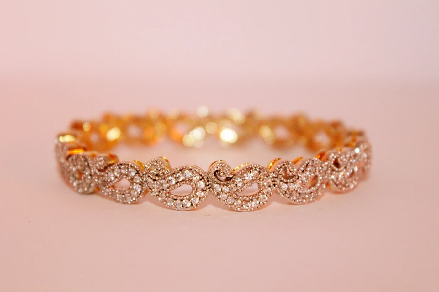 Rose gold bracelet with pave-set stones