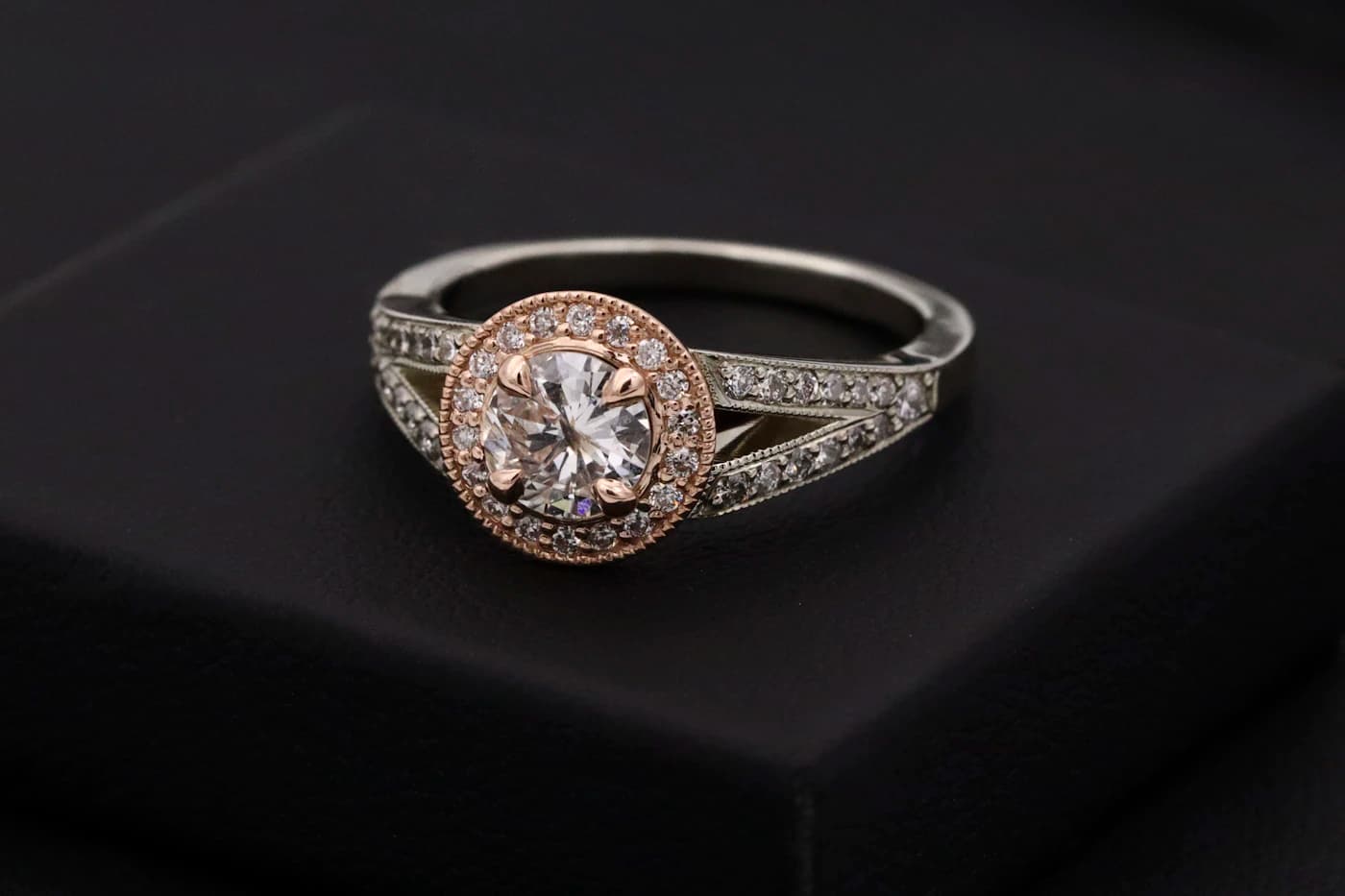 Diamond engagement ring displayed on a jewellery box