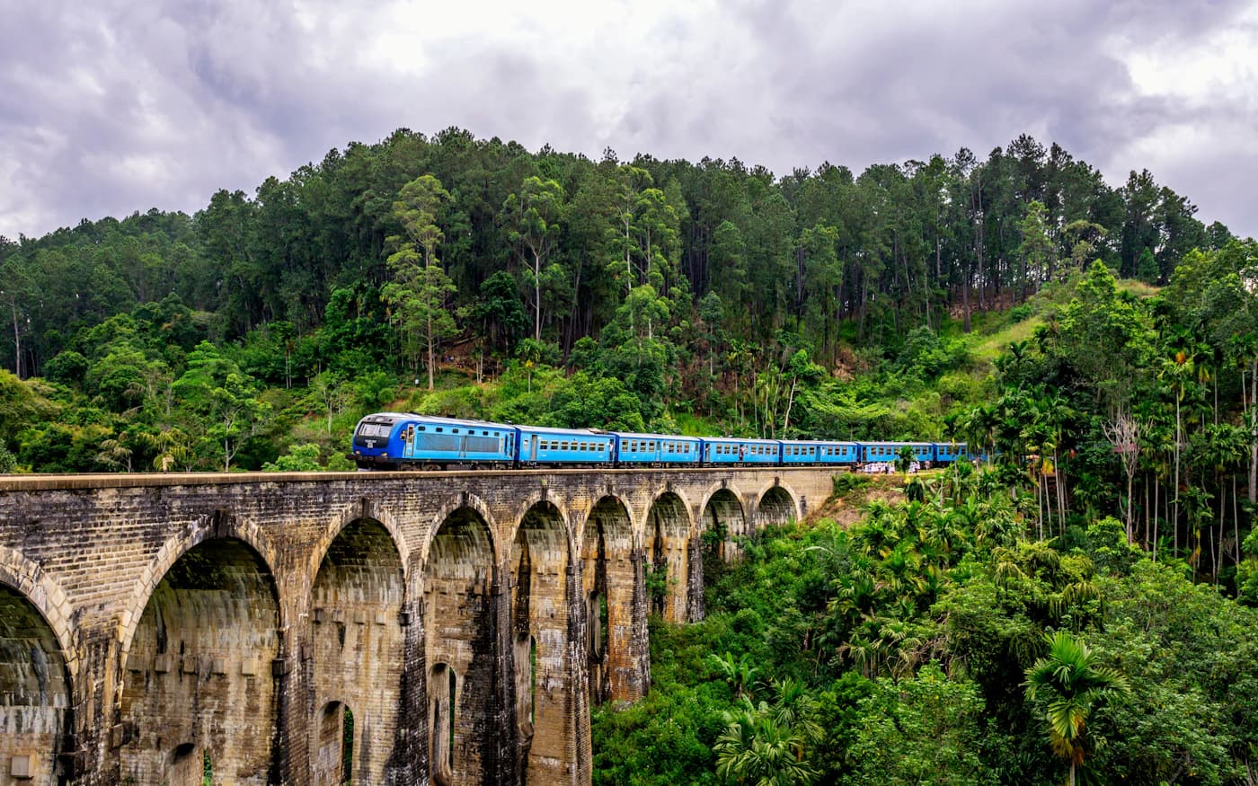 Train crossing the Nine Arch Bridge in Ella, Sri Lanka