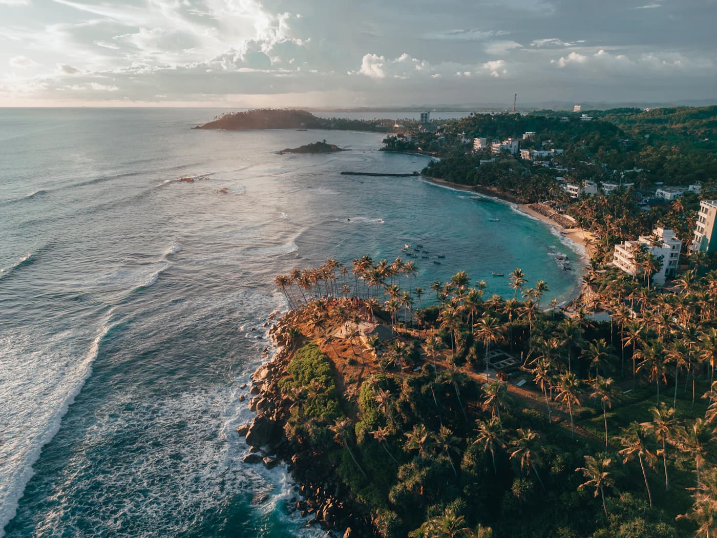 Aerial view of a coastal headland and beach in Sri Lanka